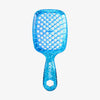Die UNbrush Detangling Hair Brush Mini ist eine blaue, glitzernde Bürste mit einem wabenförmigen, belüfteten Design auf weißem Hintergrund.
