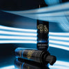 Zwei Bondi Sands Self Tanning Foam 1 Hour Ultra Express Flaschen sind mit blauen Lichtstreifen im Hintergrund abgebildet.