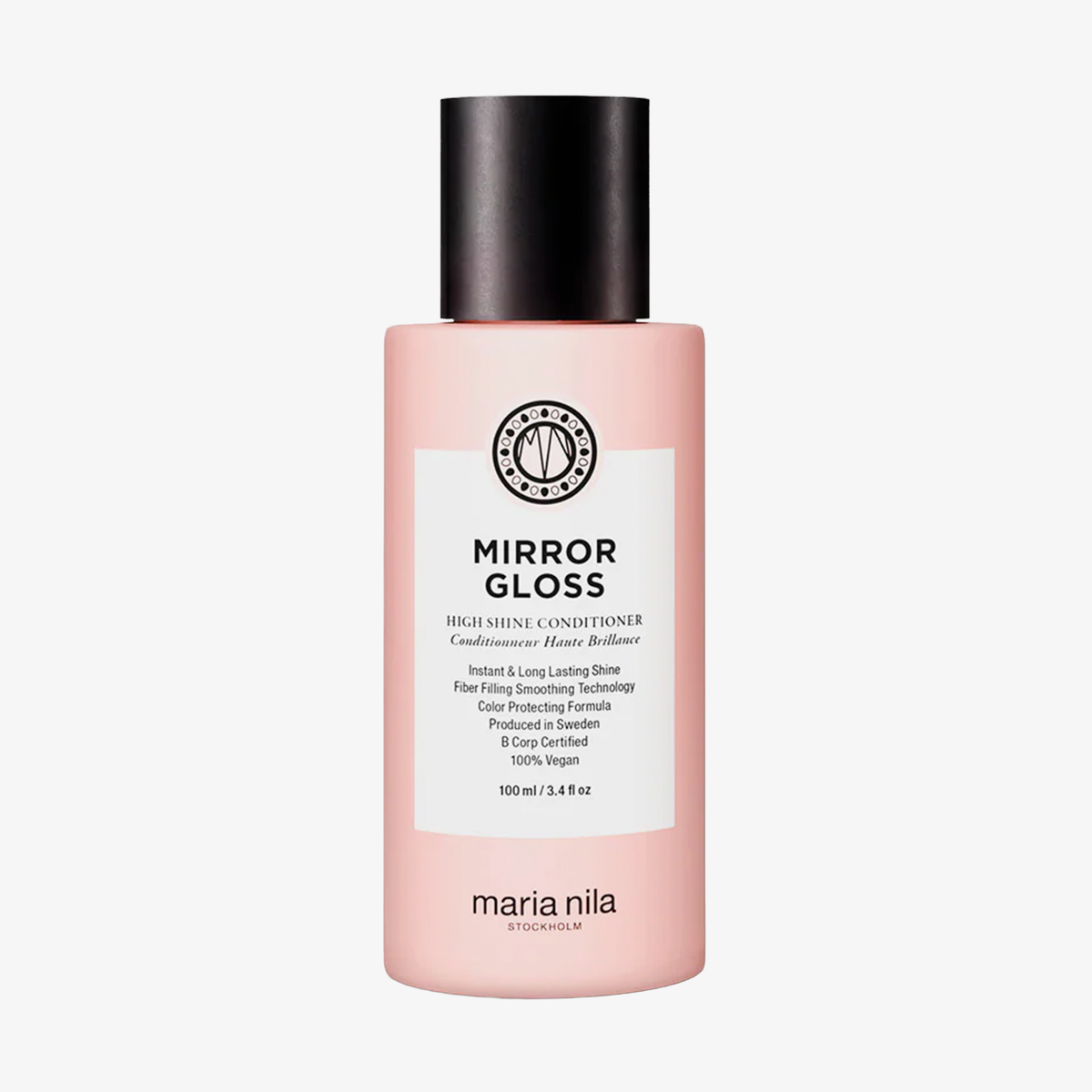 Eine rosa „Maria Nila Mirror Gloss Conditioner“-Flasche mit schwarzem Verschluss vor weißem Hintergrund.