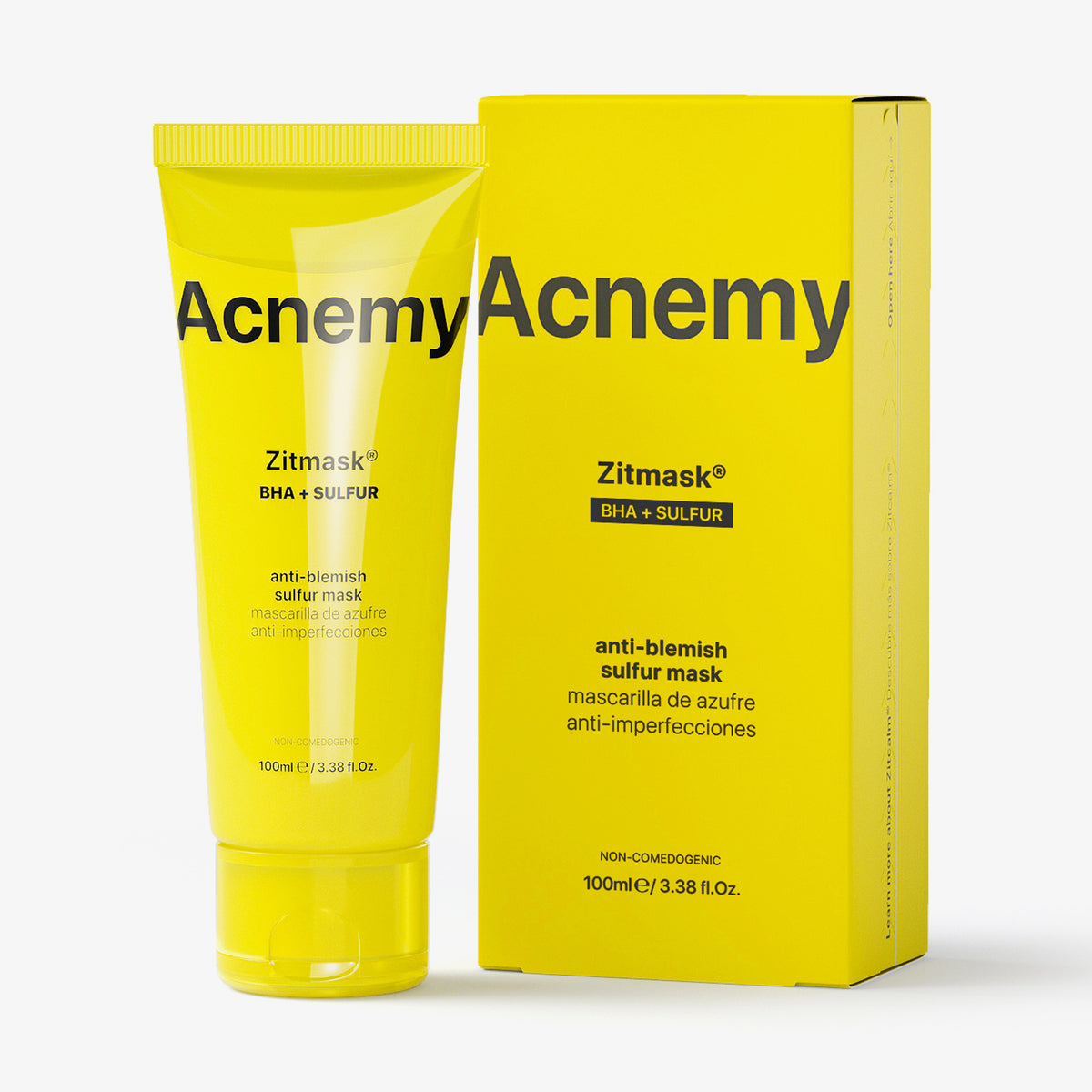 Die gelbe Acnemy Zitmask Tube und Verpackung vor weißem Hintergrund