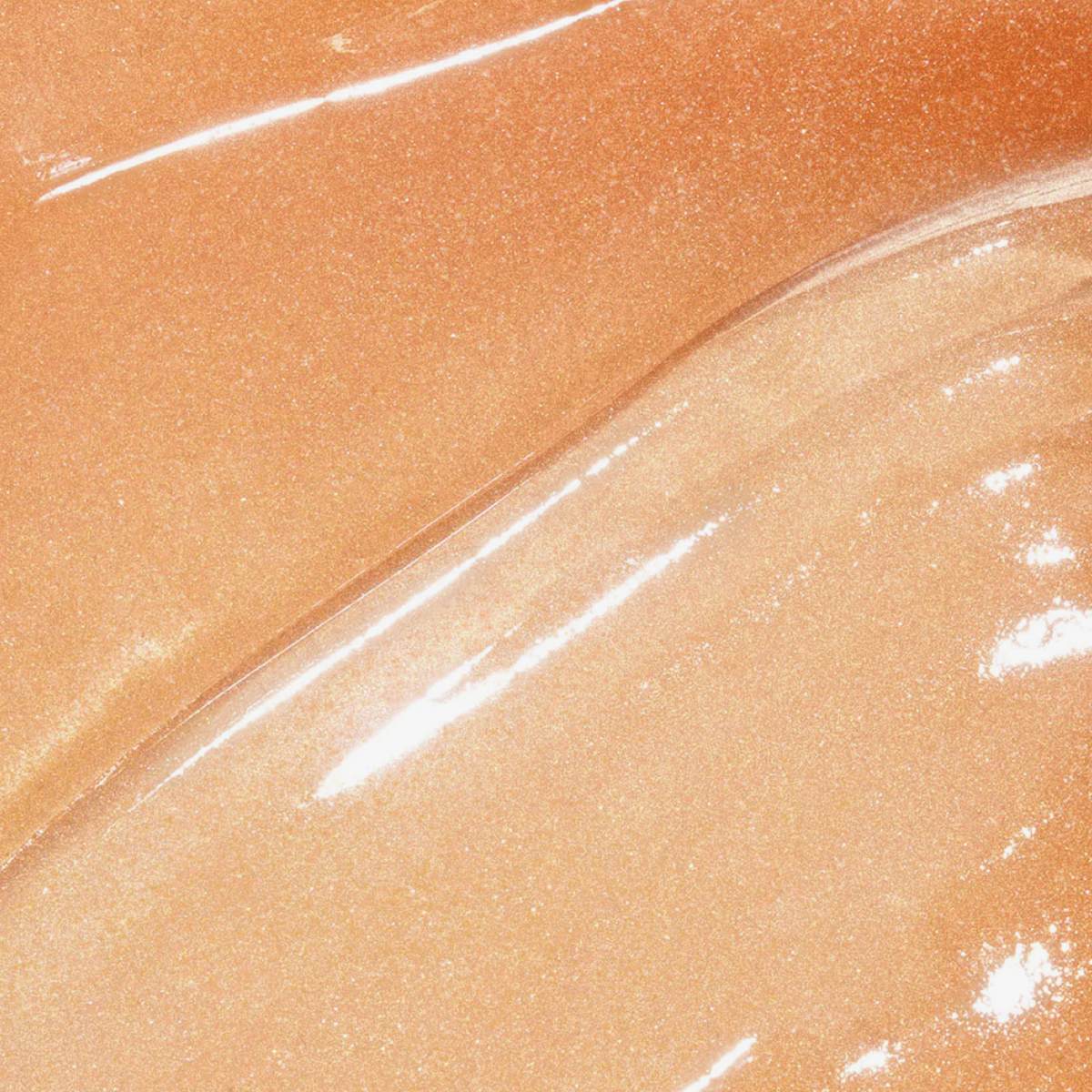 Nahaufnahme des „Bali Body Sheer Glow Sunscreen Gel SPF 50“, das einen pfirsich-goldenen Schimmer mit geschwungenen, reflektierenden Lichtakzenten zeigt.
