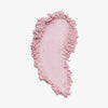 Ein rosa Puderstreifen BPerfect Cosmetics x Katie Daley Perfect Powders Candyfloss auf weißem Hintergrund.