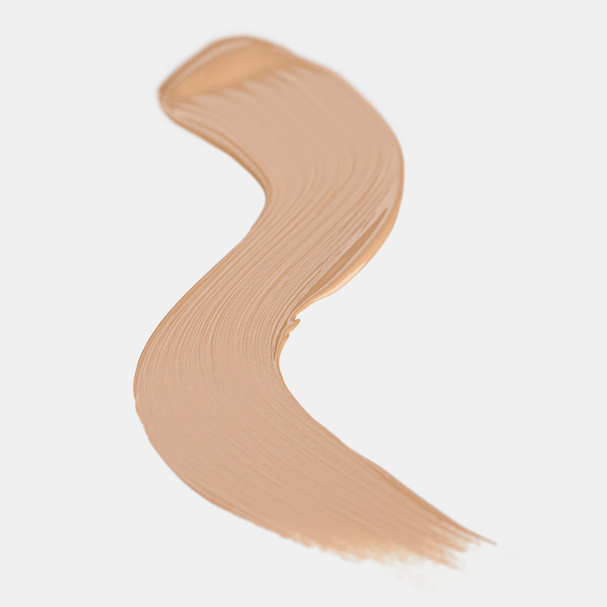 Cremiger Farbstreifen des Catrice Instant Bright Serum Concealers in der Farbe 020W (warmes Beige) auf heller Oberfläche.