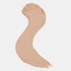 Cremiger Farbstreifen des Catrice Instant Bright Serum Concealers in der Farbe 032N (neutrales mittleres Beige) auf heller Oberfläche.