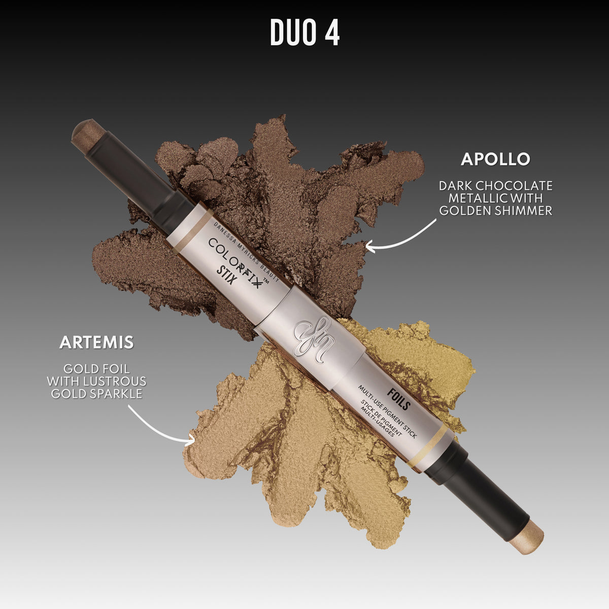 Zweiseitiger Pigment-Stick mit schimmernden Nuancen: „Apollo“ (Schokobraun mit Goldschimmer) und „Artemis“ (Goldfolie mit Glitzer).