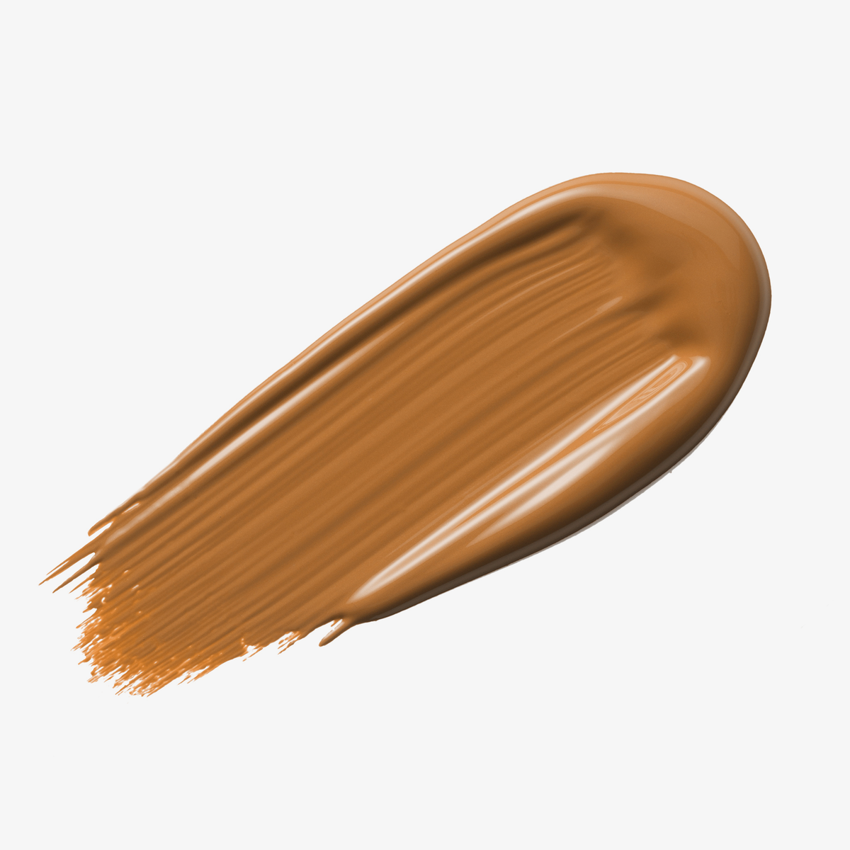 Warmes braunes Farbmuster des Yummy Skin Serum Tint vor weißem Hintergrund.