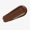 Tiefbraunes Farbmuster des Yummy Skin Serum Tint 15 auf weißem Hintergrund.
