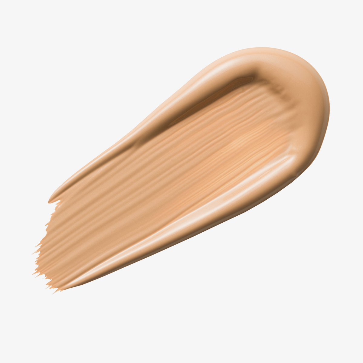 Mittelbeiges Farbmuster des Yummy Skin Serum Tint 4 vor weißem Hintergrund.