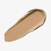 Ein beiger Farbstreifen Yummy Skin Blurring Balm Powder Shade 3 auf weißem Hintergrund.