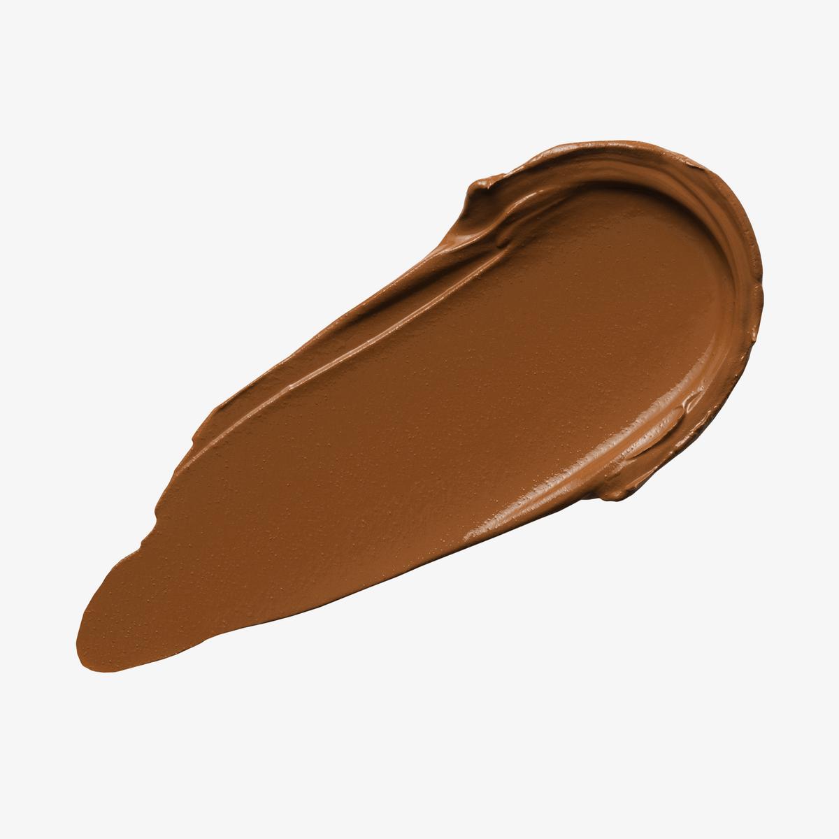 Ein warmbrauner Farbstreifen Yummy Skin Blurring Balm Powder Shade 8.5 auf weißem Hintergrund.