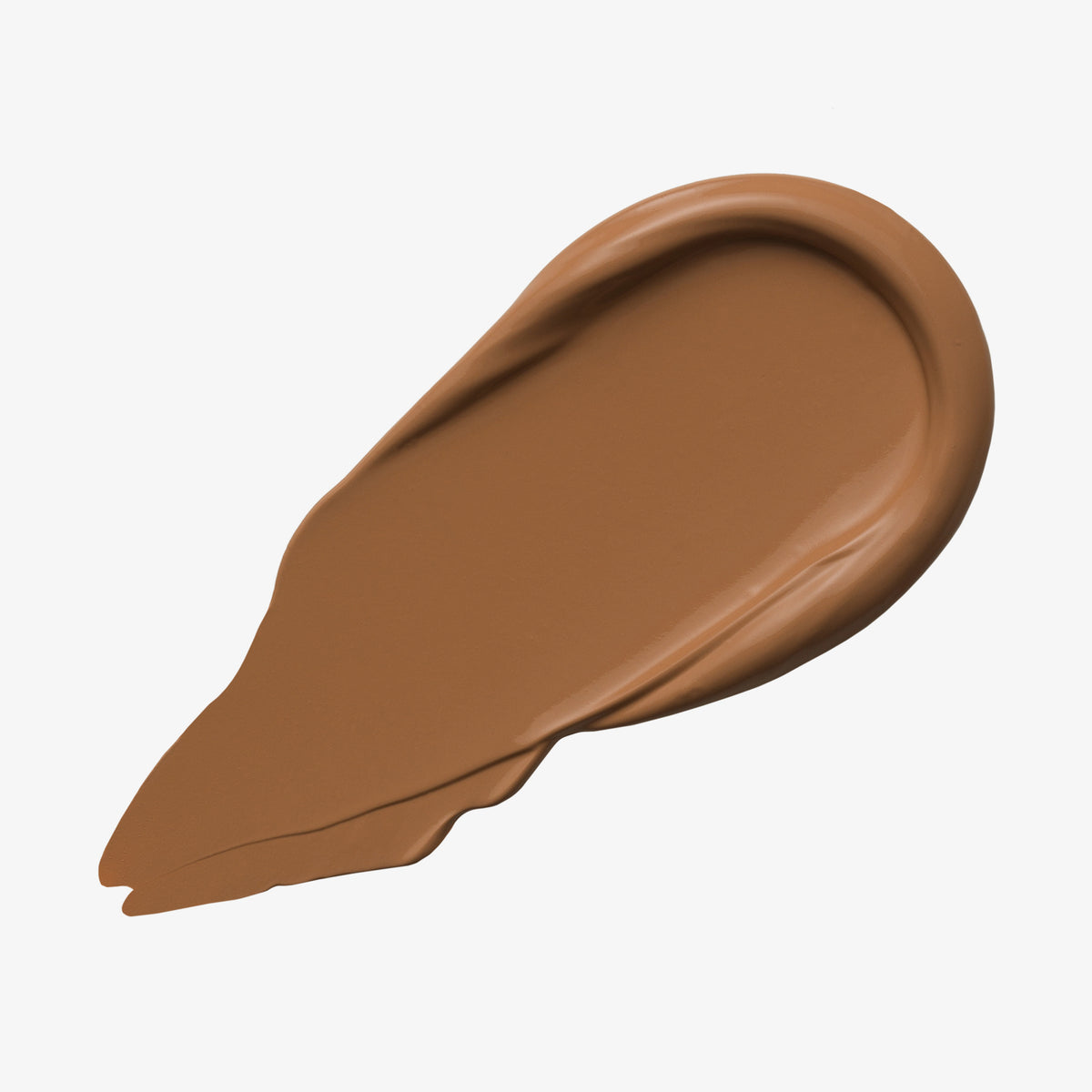 Ein mittelbrauner Farbstreifen Yummy Skin Lift & Flex Concealer 10 auf weißem Hintergrund.