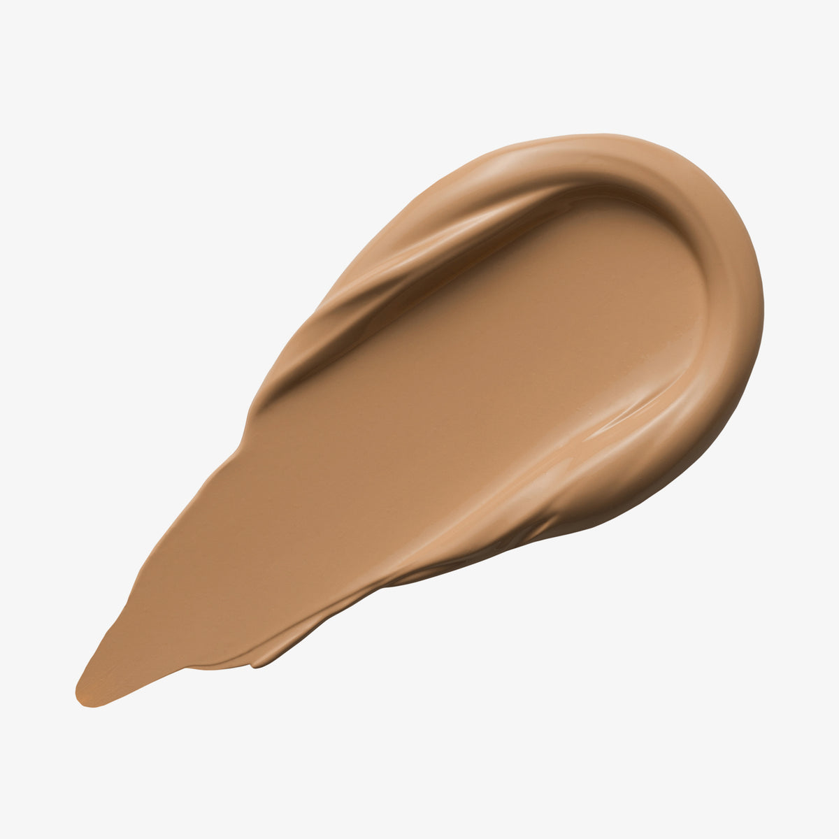 Ein beiger Farbstreifen Yummy Skin Lift & Flex Concealer 6 auf weißem Hintergrund.