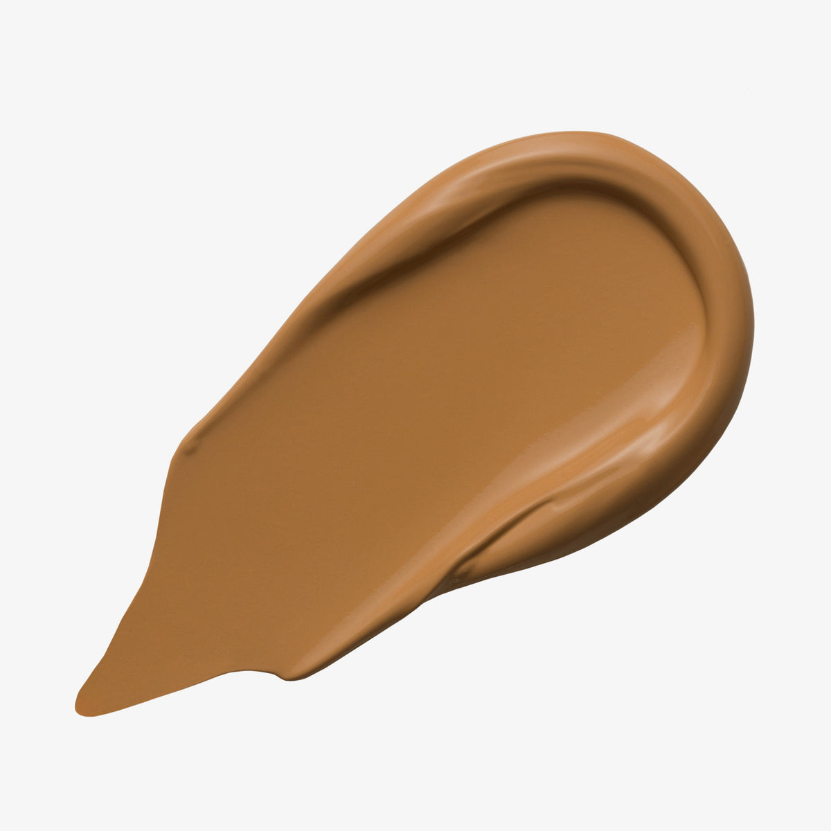 Ein brauner Farbstreifen Yummy Skin Lift & Flex Concealer 9 auf weißem Hintergrund.