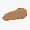 Farbmuster des Silktone Cream Bronzer in einem cremigen, hellbraunen Farbton, auf weißem Hintergrund verschmiert.
