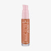 Transparente Flasche MAGIC FILTER Glow Booster im Farbton 50 Tan/ Deep mit rosa Pumpe und warmbraunem Inhalt.