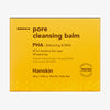 Gelbe Schachtel Hanskin Pore Cleansing Balm PHA mit braunem Text vor weißem Hintergrund.
