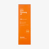 Orangefarbene Box des Hanskin Pore Cleansing Oil AHA mit weißem Text auf weißem Hintergrund.