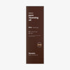 Braune Schachtel Hanskin Pore Cleansing Oil BHA mit weißem Text vor weißem Hintergrund.