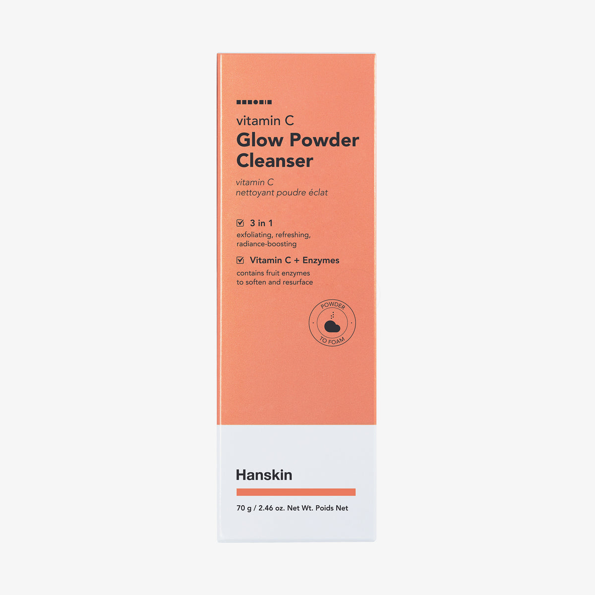 Orange-weiße Schachtel mit Vitamin C Glow Powder Cleanser mit Produktdetails auf der Vorderseite.