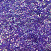Nahaufnahme der Textur des des Opal Moonstone Loose Multichrome Eyeshadow Cry Baby; ein lila schimmerndes Pigment.