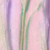 Nahaufnahme der Textur des Opal Shadow Potion Silky Gel Eyeshadow Cozy; eine lila-grünlich schimmernde Pigmentcreme.