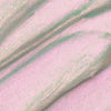 Nahaufnahme der Textur des Opal Shadow Potion Silky Gel Eyeshadow Rpckabye Baby; eine lila-grünlich schimmernde Pigmentcreme.