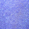 Nahaufnahme der Textur des Pastel Duochromes Loose Eyeshadow Ribbon; ein lila schimmerndes Pigment.