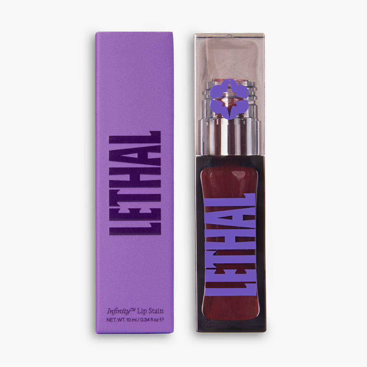 Eine lila Schachtel und eine Flasche Infinity Lip Stains von Lethal Cosmetics mit der Aufschrift LETHAL" in fetten lila Buchstaben auf weißem Hintergrund.