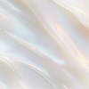 Nahaufnahme der weißen seidigen Textur des Living Proof High-Shine Gloss mit  welliger Oberfläche und perlmuttartigem Glanz.