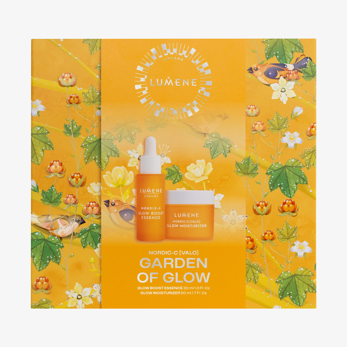 Lumene GARDEN OF GLOW SET 2026 in einer orangefarbenen Schachtel mit Blumenmuster, mit Glow Boost Essence und Feuchtigkeitscreme.