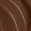 Nahaufnahme der dunkelbraunen cremigen Textur der Lumene Invisible Illumination Serum in Foundation SPF30 in der Farbe 9.