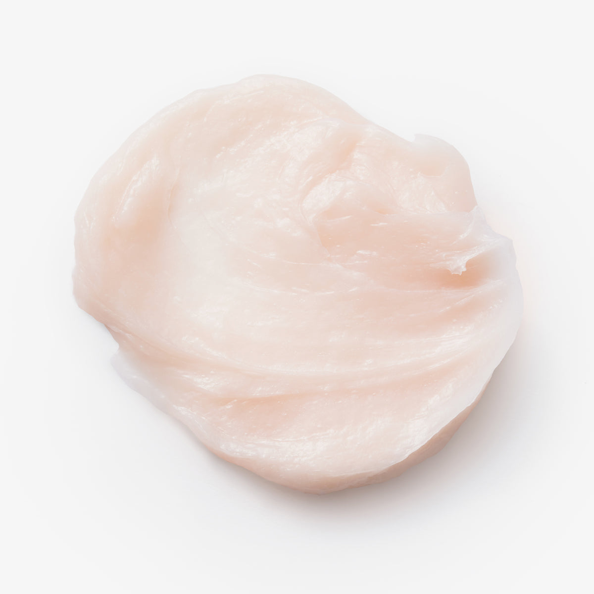 Ein cremefarbener Klecks Booster Masque Luminous Colour von maria nila ist auf weißem Hintergrund abgebildet.