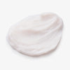 Weißer Klecks der maria nila Booster Masque Pure Volume auf weißem Grund.