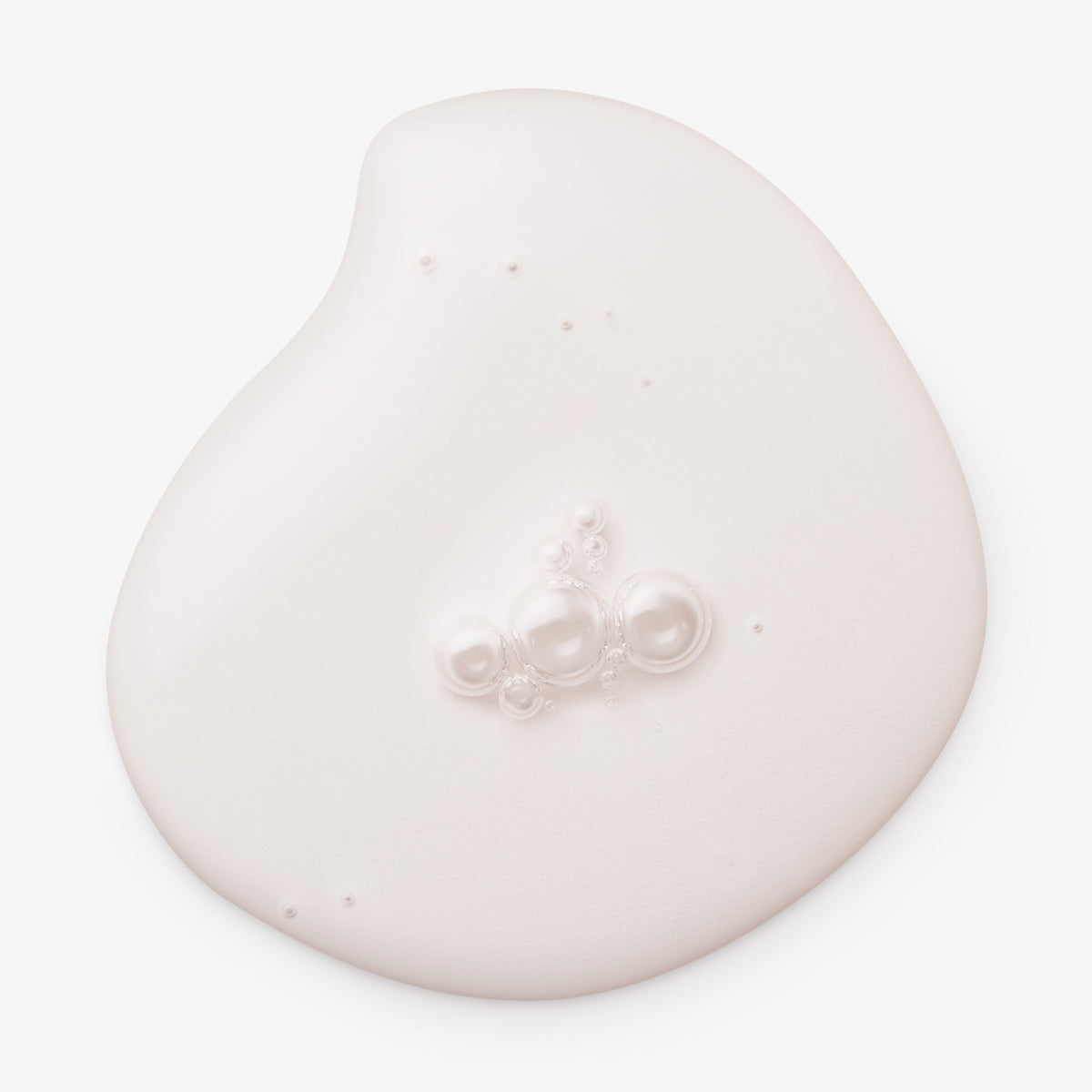 Auf einem weißen Hintergrund ist ein Klecks maria nila Head & Hair Heal Soothing Serum abgebildet.