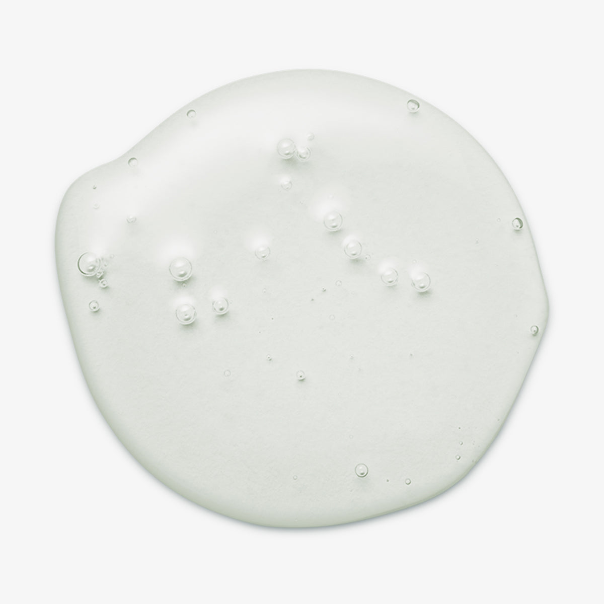 Klares Gel mit kleinen Bläschen auf weißem Hintergrund, das die Textur des maria nila Purifying Cleanse Shampoo zeigt.