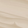 Die Mario Badescu Drying Cream hat eine weiche, cremig-beige Textur mit sanften, fließenden Wellen und dezenten Highlights.