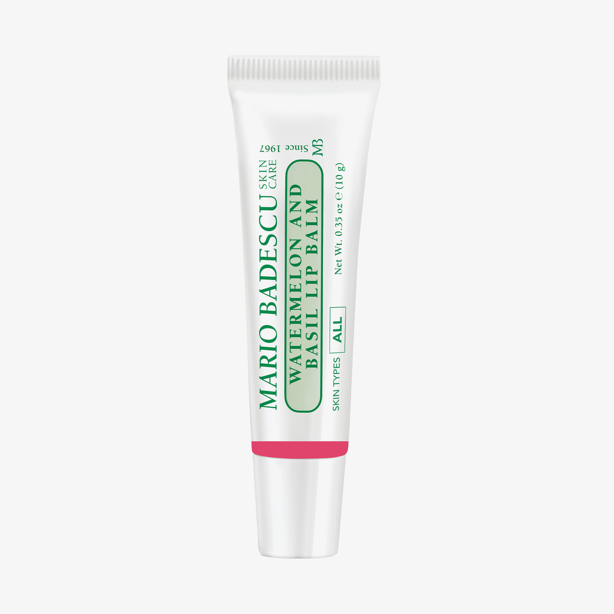 Weiße Tube mit der Aufschrift Mario Badescu Pomegranate and Guava Lip Balm mit grünem und rosa Text.
