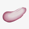 Ein Abstrich des Hydramorphosis Lippenstifts von Mesauda Beauty auf einem weißen Hintergrund verschmiert.
