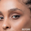 Nahaufnahme eines Frauengesichts mit natürlichen Augenbrauen und Make-up, mit dem Wort BEFORE, das die Signabrow von Mesauda Beauty hervorhebt.