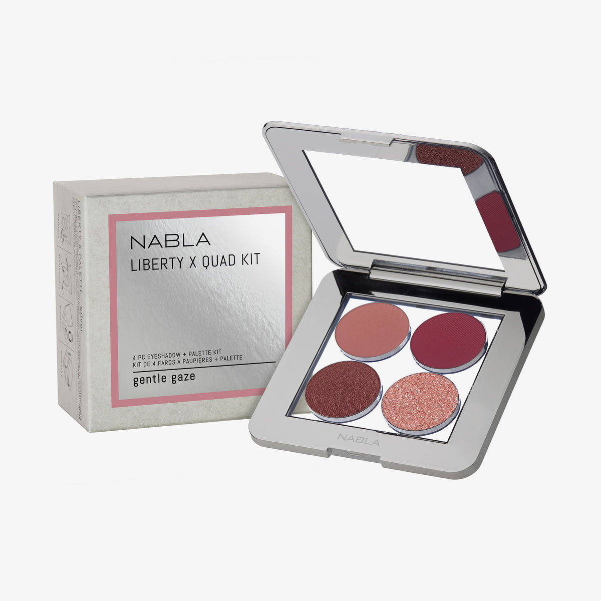 Geöffnete NABLA Liberty X Quad Kit Palette mit vier Lidschatten neben der passenden Verpackung.