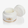 Offene weiße Dose der Viper Lip Mask – Coconut Cream von NABLA, mit einem Deckel mit Schlangenmuster auf weißem Hintergrund.