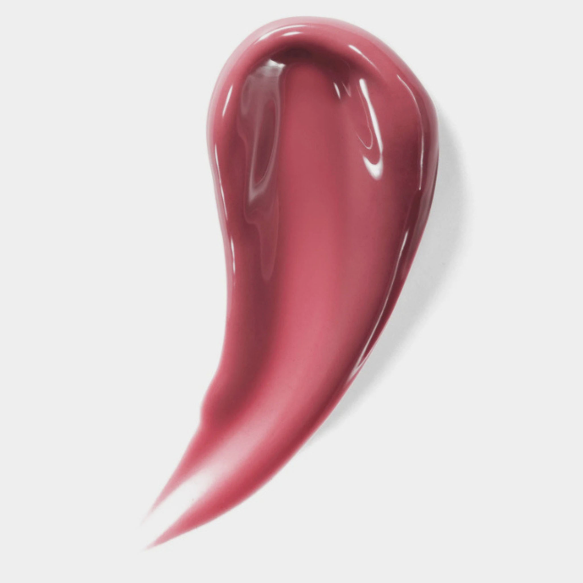Ein Wisch mit NERDS. Peptide + Hyaluronic Acid Lip Treatment in glänzendem Mauve auf weißem Grund.