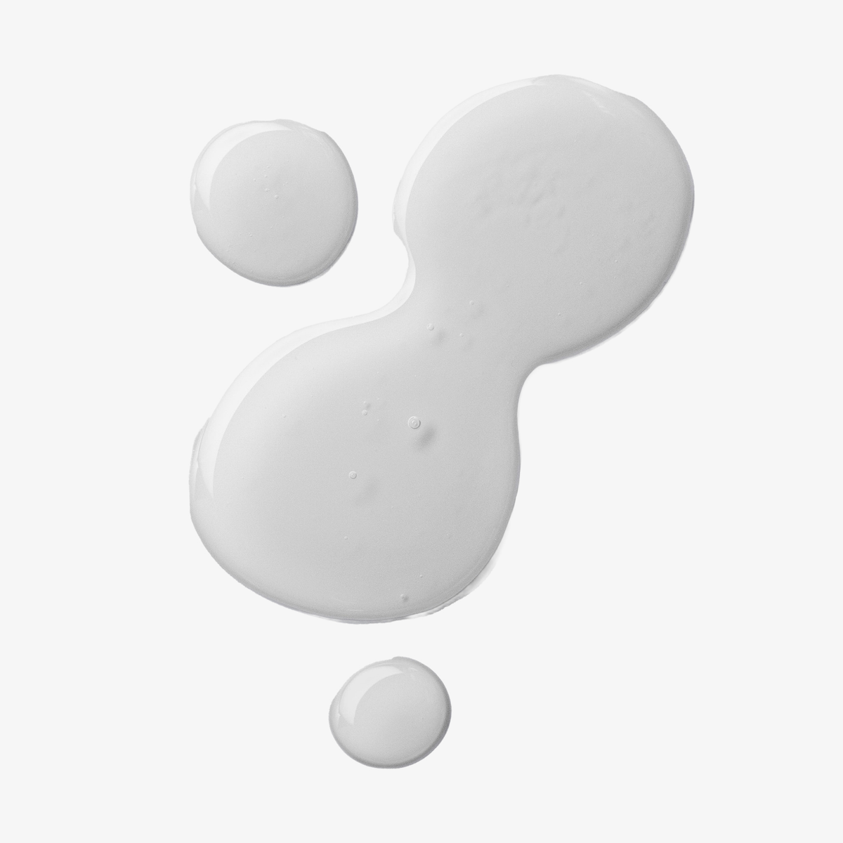 Vier Tropfen Philip Kingsley Bond Builder Lipid Shield Oil 30 auf weißem Hintergrund: ein großer Tropfen in Form einer Acht und drei kleinere Tropfen.