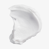 Elasticizer Extreme von Philip Kingsley: eine geschmeidige, weiße Creme, die auf einen schlichten weißen Hintergrund aufgetragen ist.