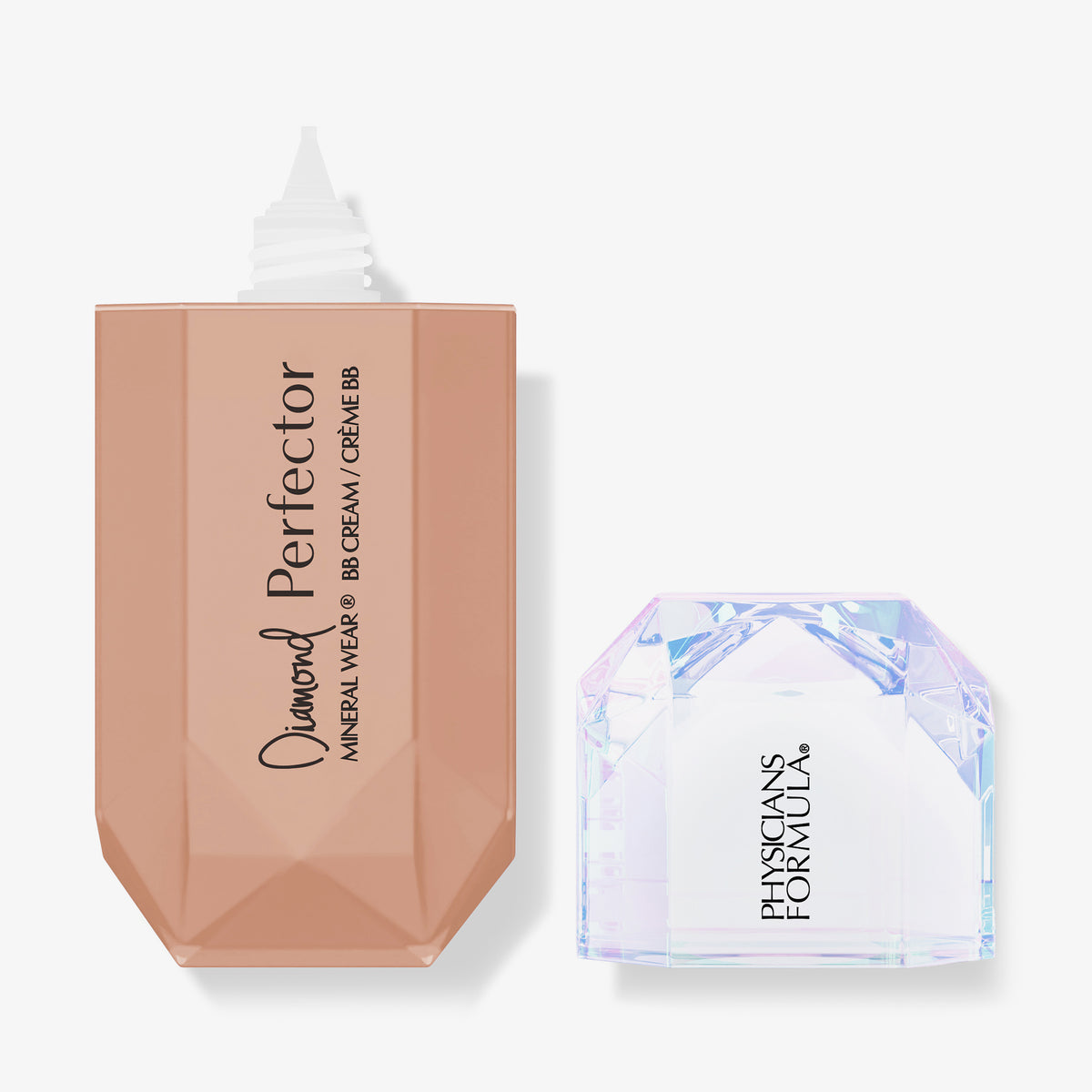 Geöffnete BB Cream in diamantförmiger Verpackung mit roséfarbener Tube und irisierendem Deckel. Aufdruck: „Diamond Perfector – Physicians Formula“.