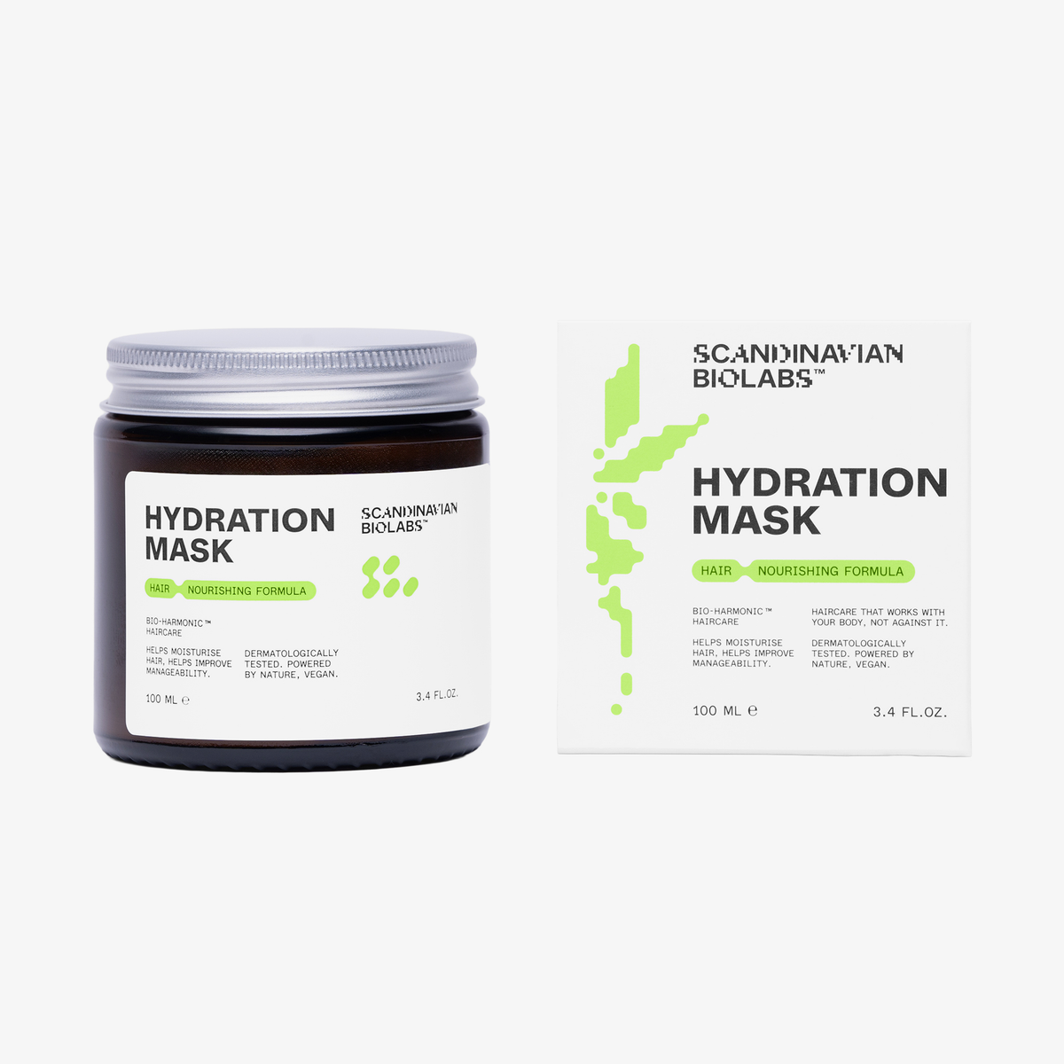 Ein brauner Glastiegel und eine weiße Schachtel der Scandinavian Biolabs Hair Hydration Mask vor weißem Hintergrund.