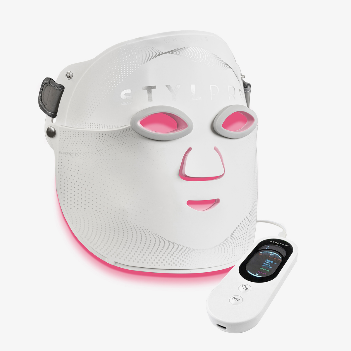 Die STYLPRO Wavelength Pro 5 in 1 LED-Maske mit rosafarbenen Lichtern und einer Fernbedienung auf weißem Hintergrund.