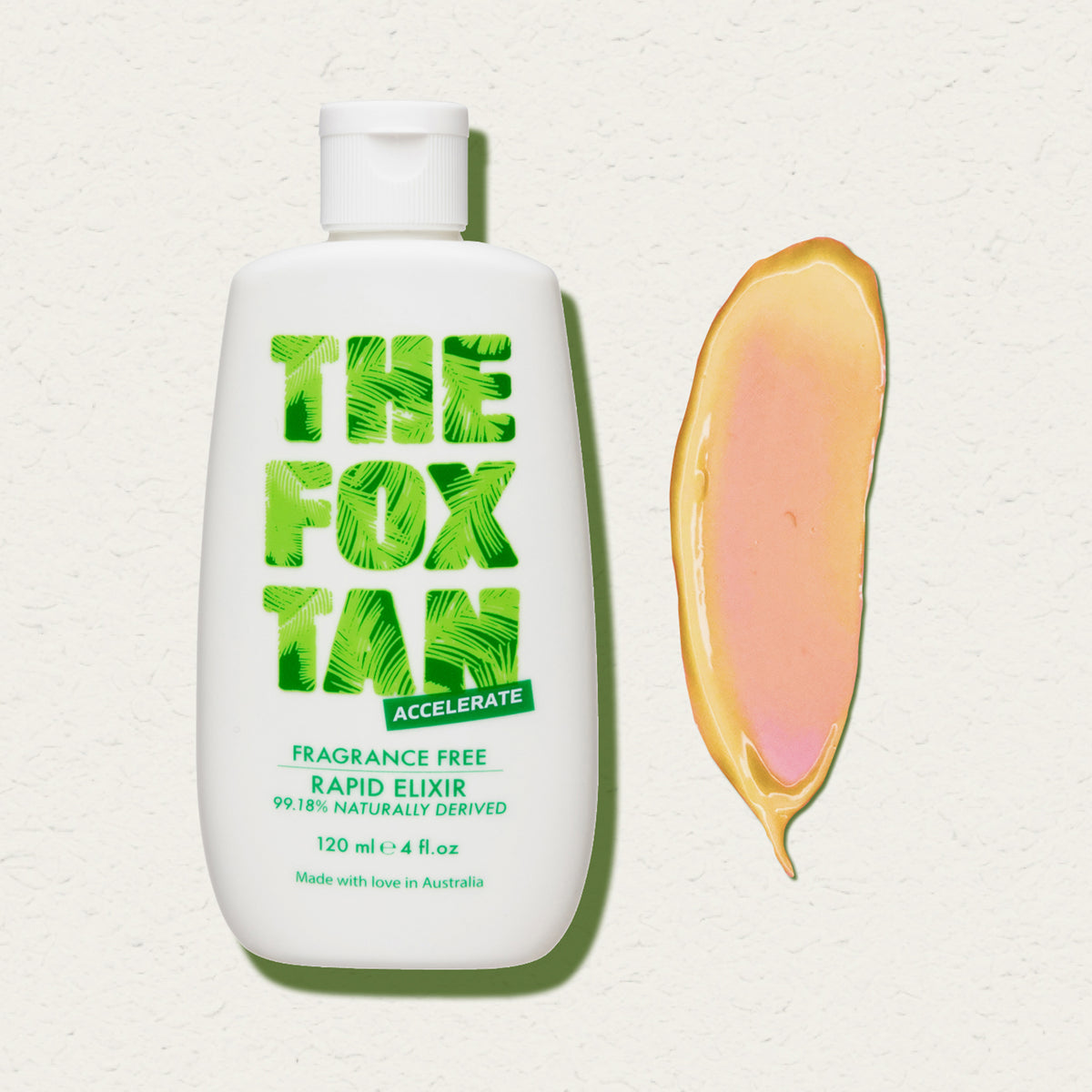Weiße Flasche des Fox Tan Rapid Elixir neben einem apricotfarbenen Produkt-Swatch auf hellem Untergrund.