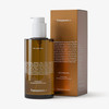 Braune Pumpflasche und Schachtel mit der Aufschrift Transparent Lab Melanoil DHA; Zutatenliste auf der Flasche.