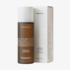 Eine Flasche Transparent Lab Strong Exfoliator und die dazugehörige Schachtel, beide deutlich mit Produktangaben beschriftet.